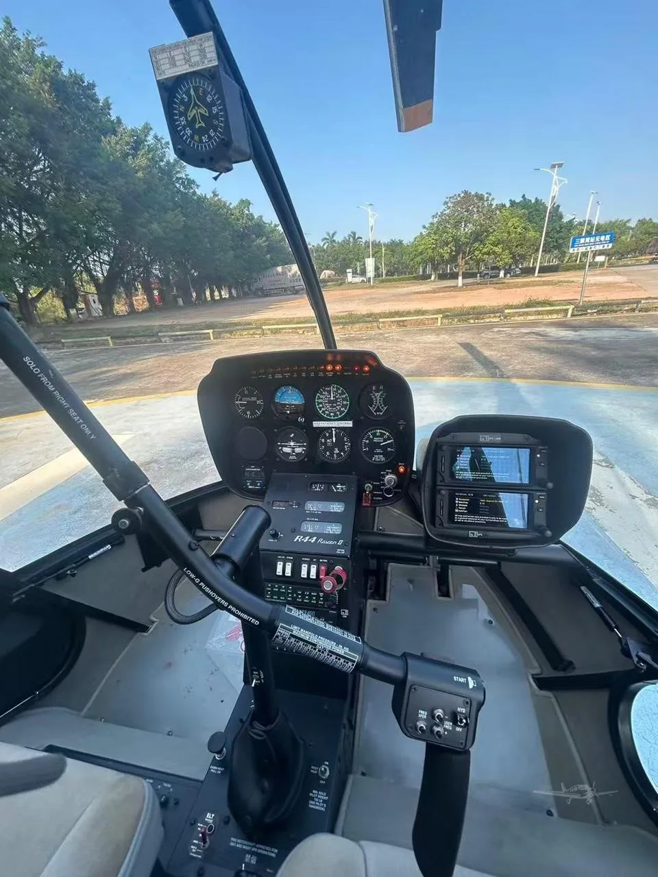 Cockpit and instrument panel of a 2016 ROBINSON R44 RAVEN II.