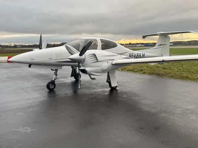 Exterior view of a 2008 DIAMOND DA42 TDI, N618KM.