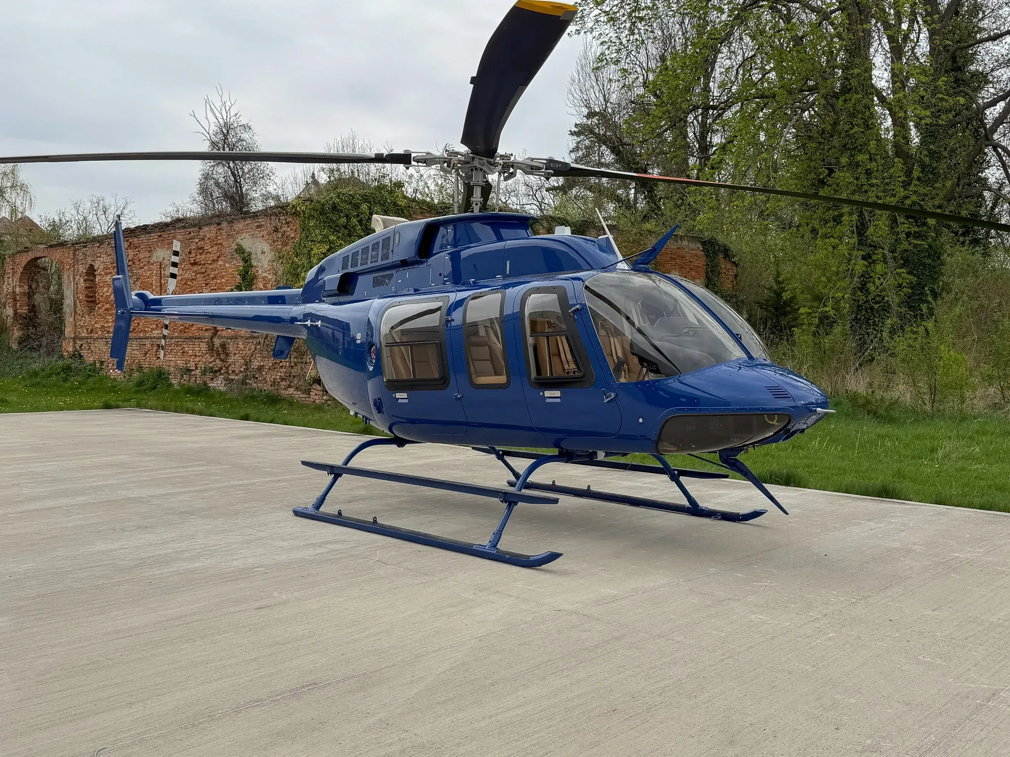 Exterior view of a 2021 Bell 407 GXI, N195DJ.