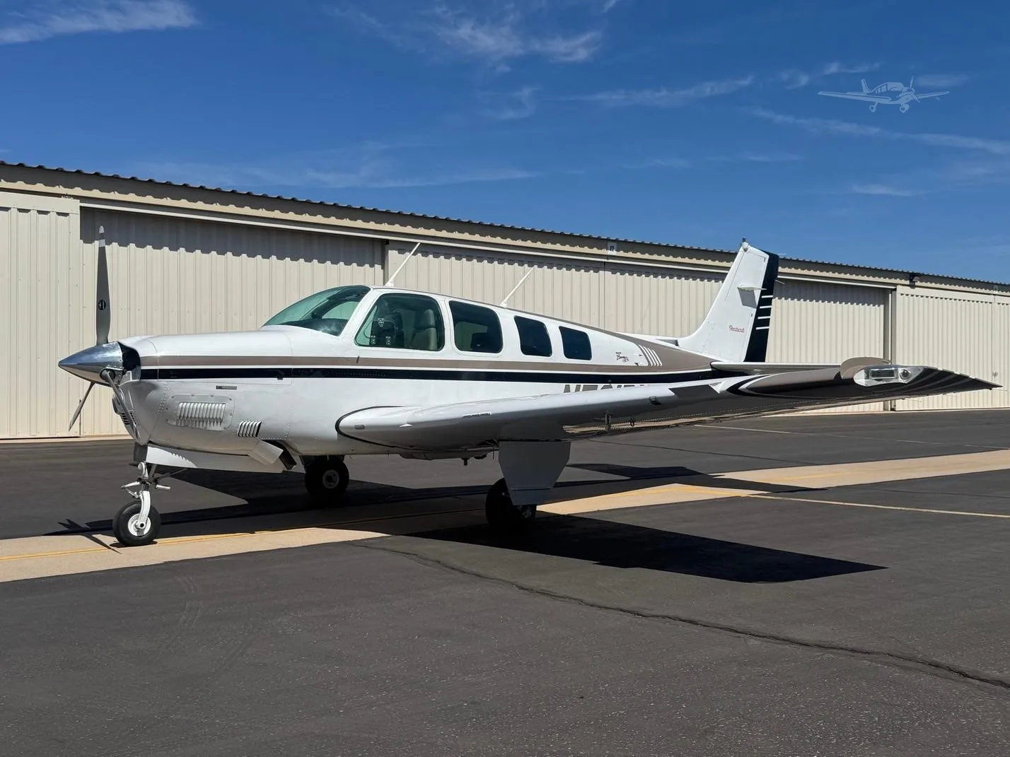 Exterior view of a 1997 BEECHCRAFT A36 BONANZA, N721DK.
