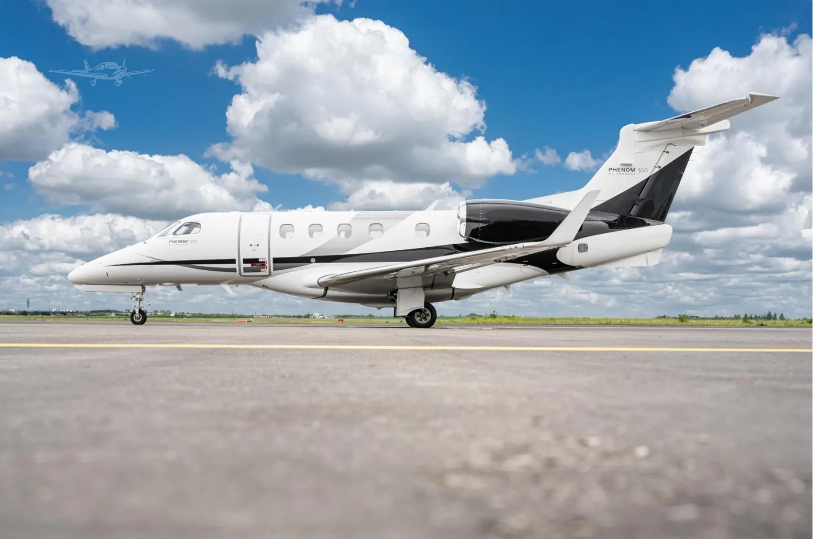 Exterior view of a 2016 EMBRAER PHENOM 300.