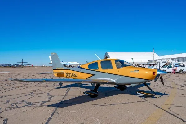 Exterior view of a 2003 Cirrus SR22, N8146J.