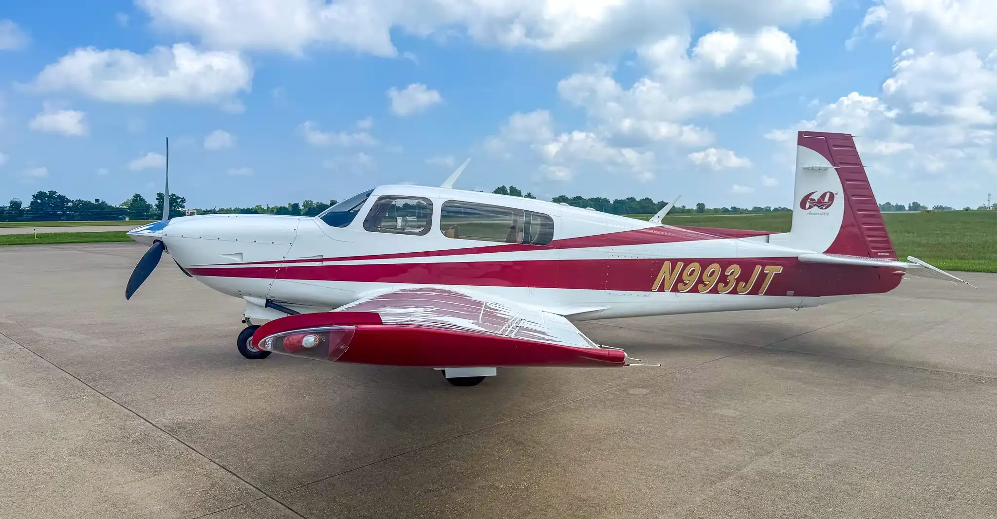 Exterior view of a 1977 Mooney M20J, N201SL.