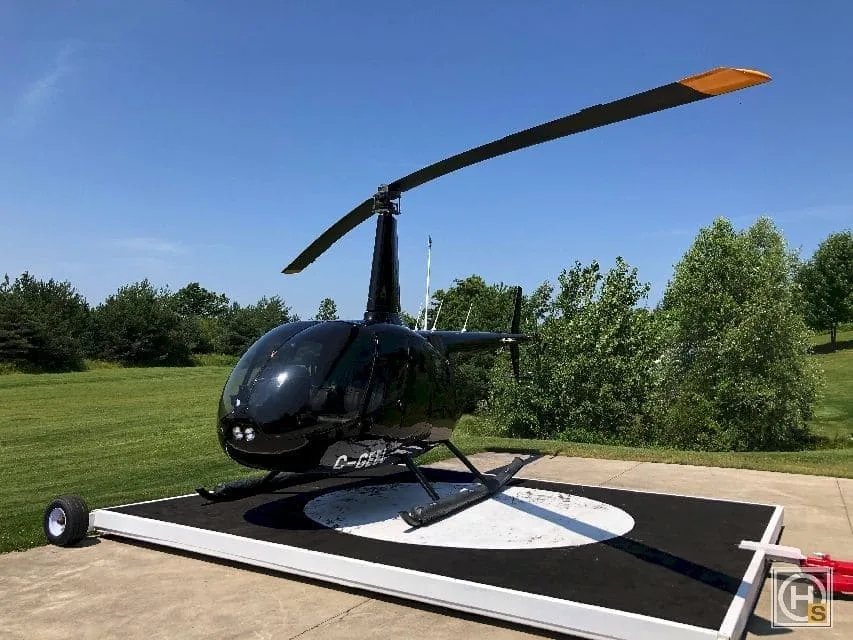 Exterior view of a 2012 Robinson R66 TURBINE.