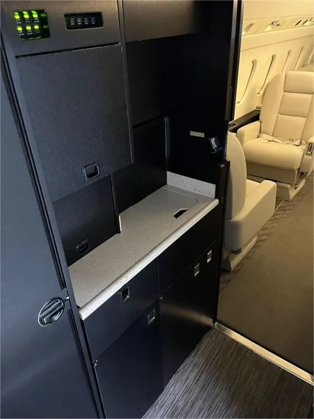 Cabin interior of a 1995 Dassault Falcon 900B.