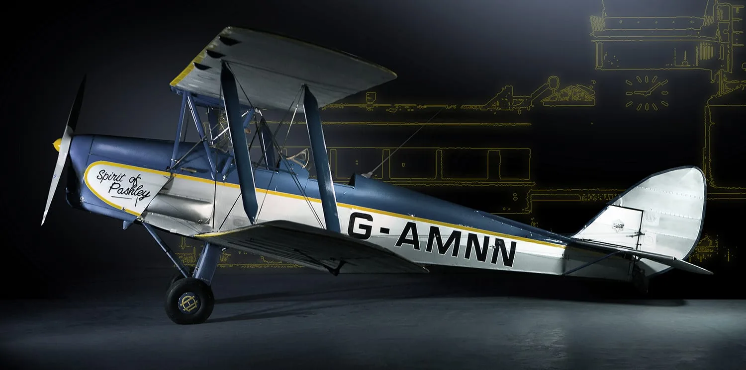 Marketing image of a de Havilland DH.82A Tiger Moth – G-AMNN – “Spirit of Pashley”.