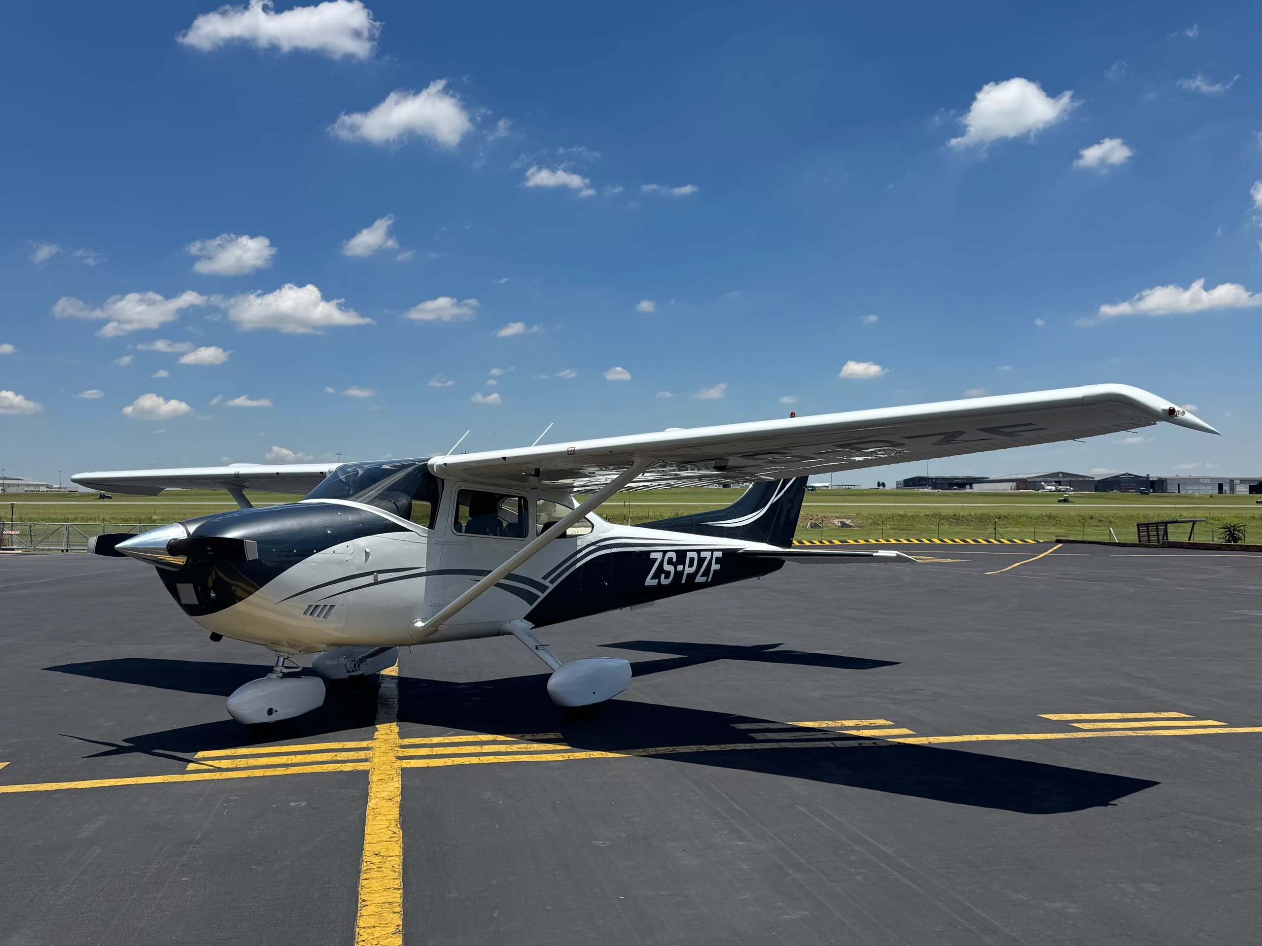 Exterior view of a 1973 Cessna 182L, ZS-PZF.