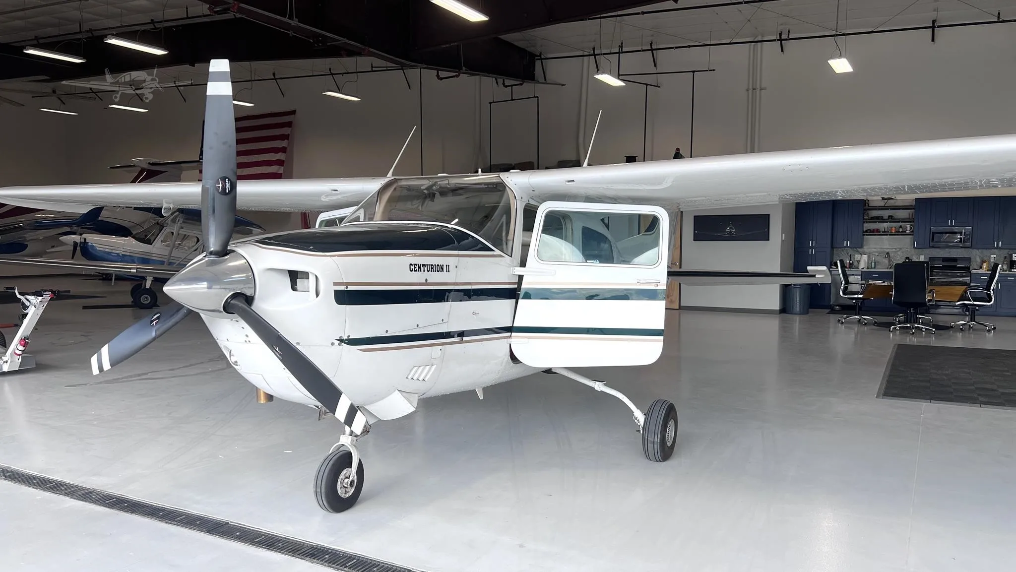 Exterior view of a 1977 CESSNA TURBO 210M, N761GY.