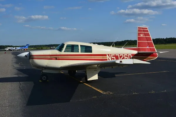 Marketing image of a 1965 Mooney M20C.