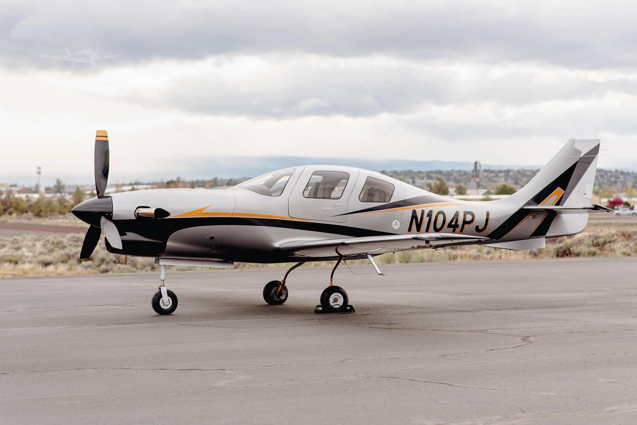 Exterior view of a 2003 LANCAIR IV-PT, N104PJ.