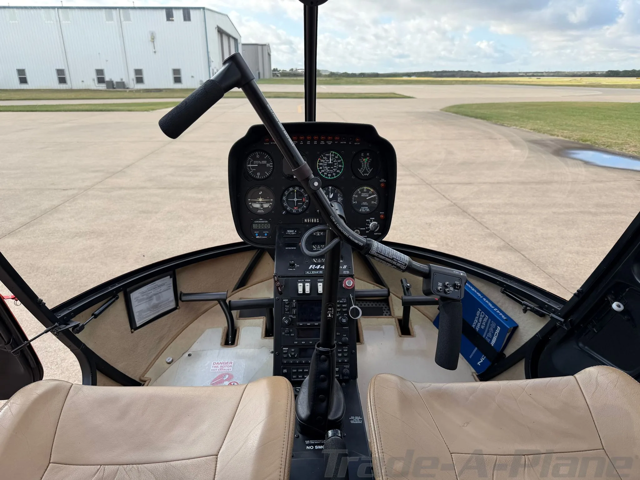 Cockpit and instrument panel of a 2015 ROBINSON R44 RAVEN II.