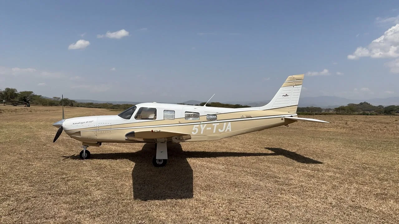 Exterior view of a 1999 Piper Saratoga, 5Y-TJA.