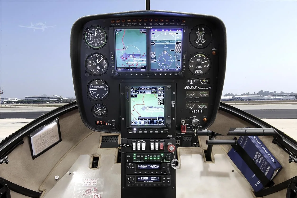 Cockpit and instrument panel of a 2026 ROBINSON R44 RAVEN II.