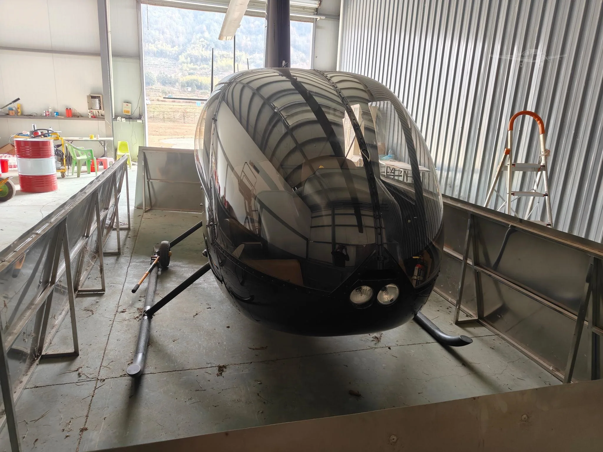 Exterior view of a 2018 ROBINSON R44 RAVEN II.