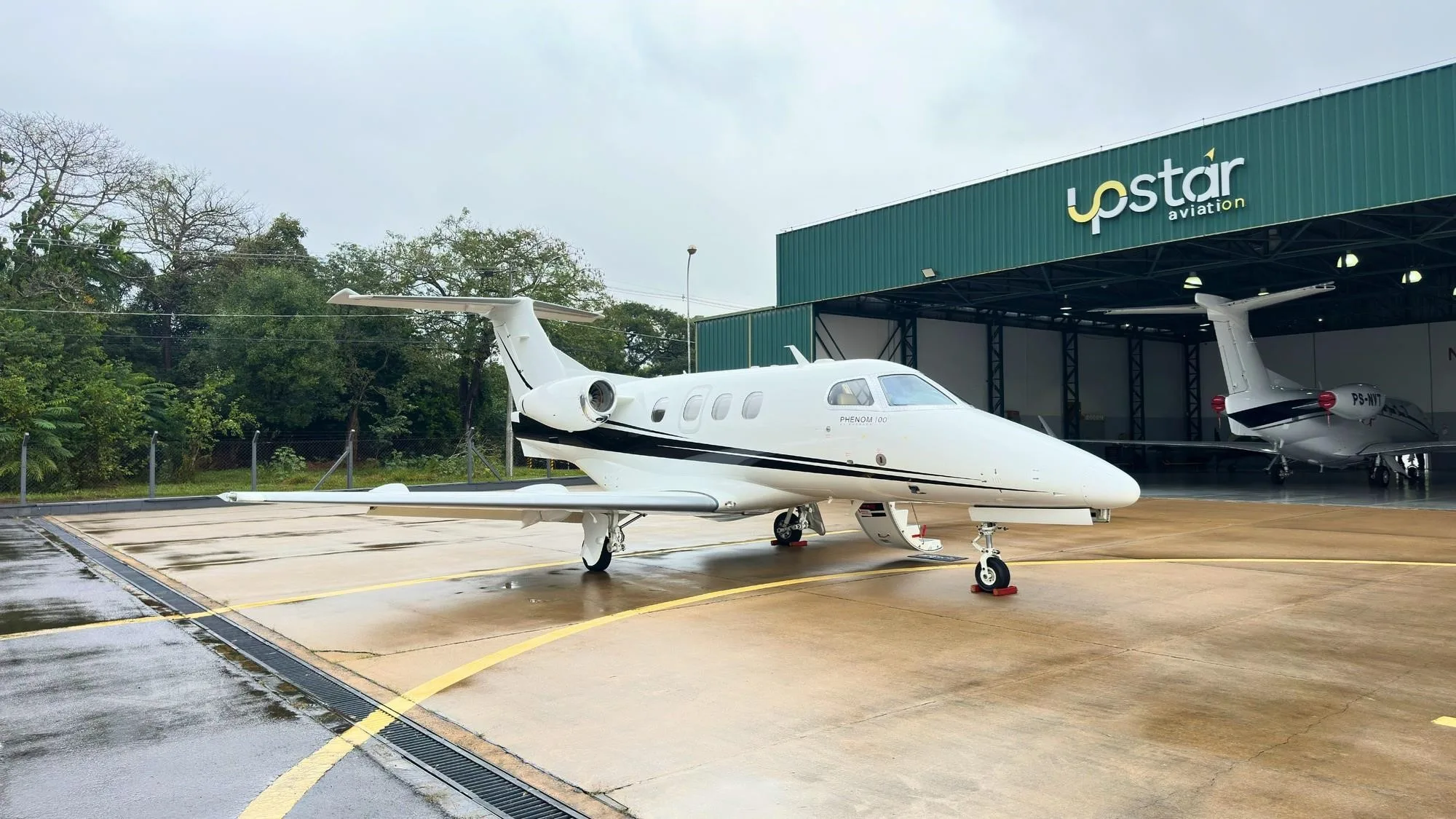 Exterior view of a 2010 EMBRAER PHENOM 100.