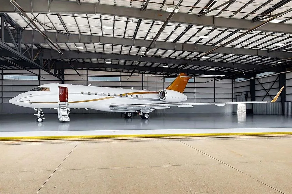 Exterior view of a 2005 Bombardier Global 5000, N214MD.