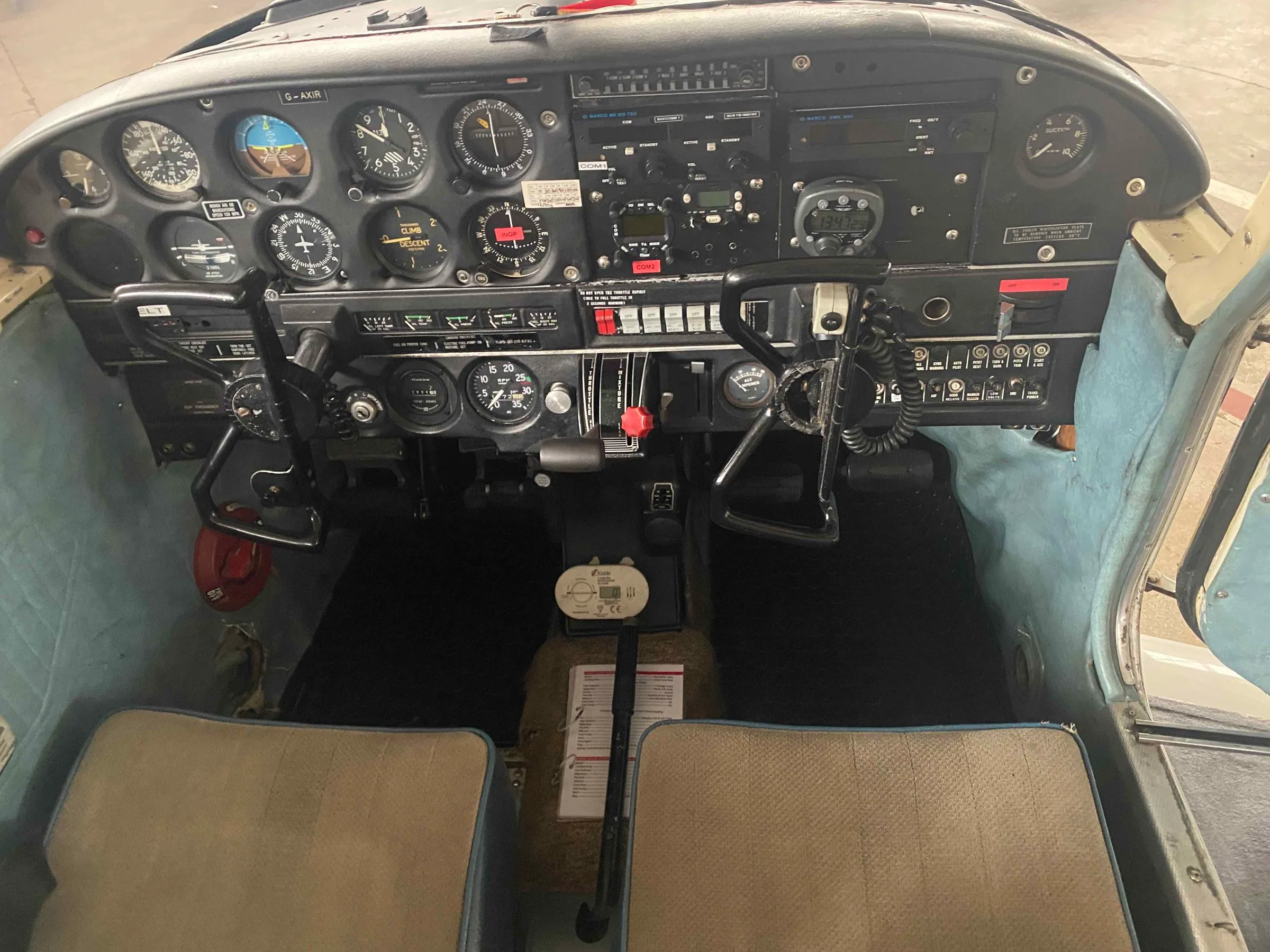 Cockpit and instrument panel of a 1969 Piper PA-28-140 Cherokee.