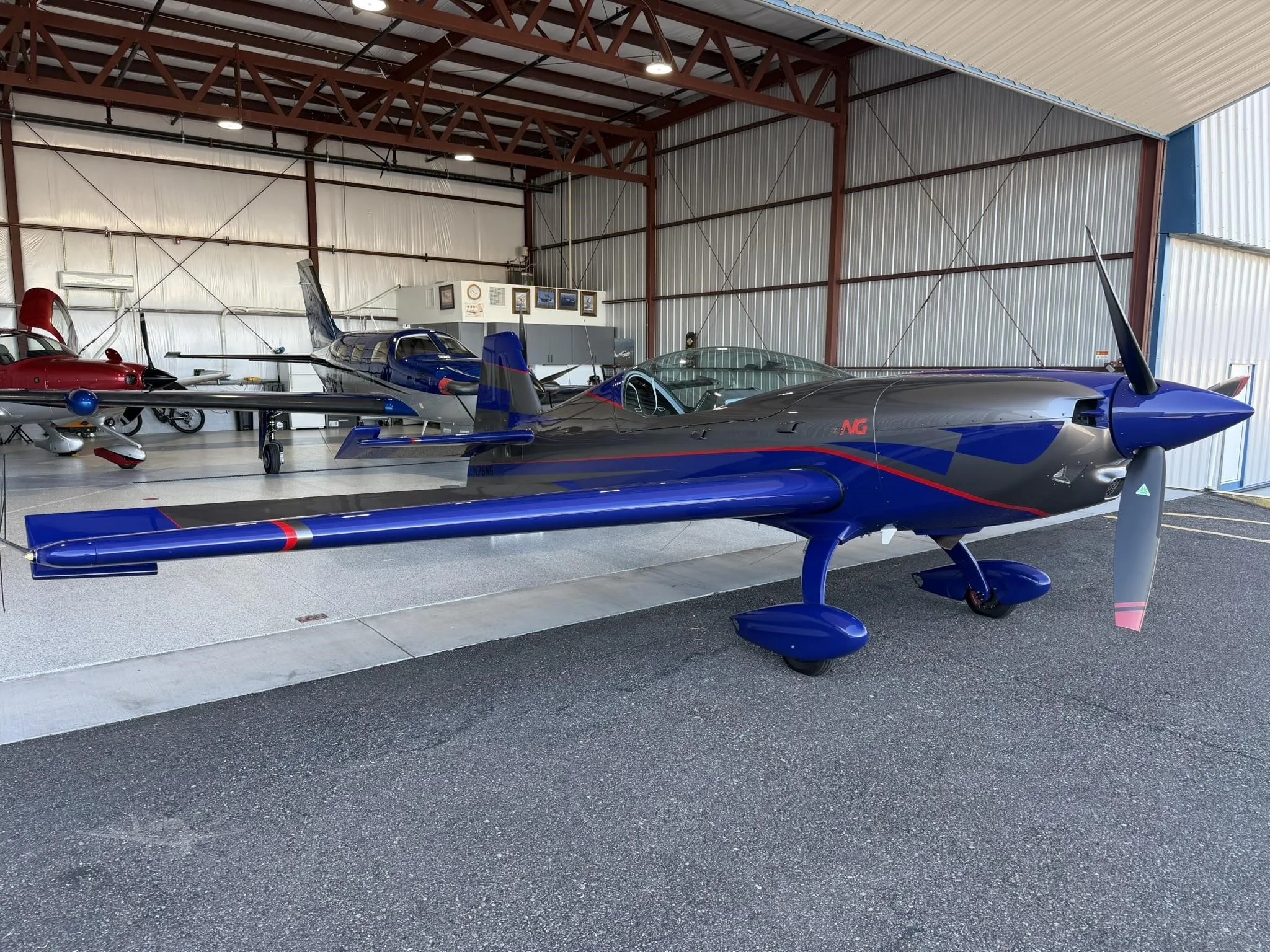 Exterior view of a 2024 EXTRA AIRCRAFT EA NG, N76NG.