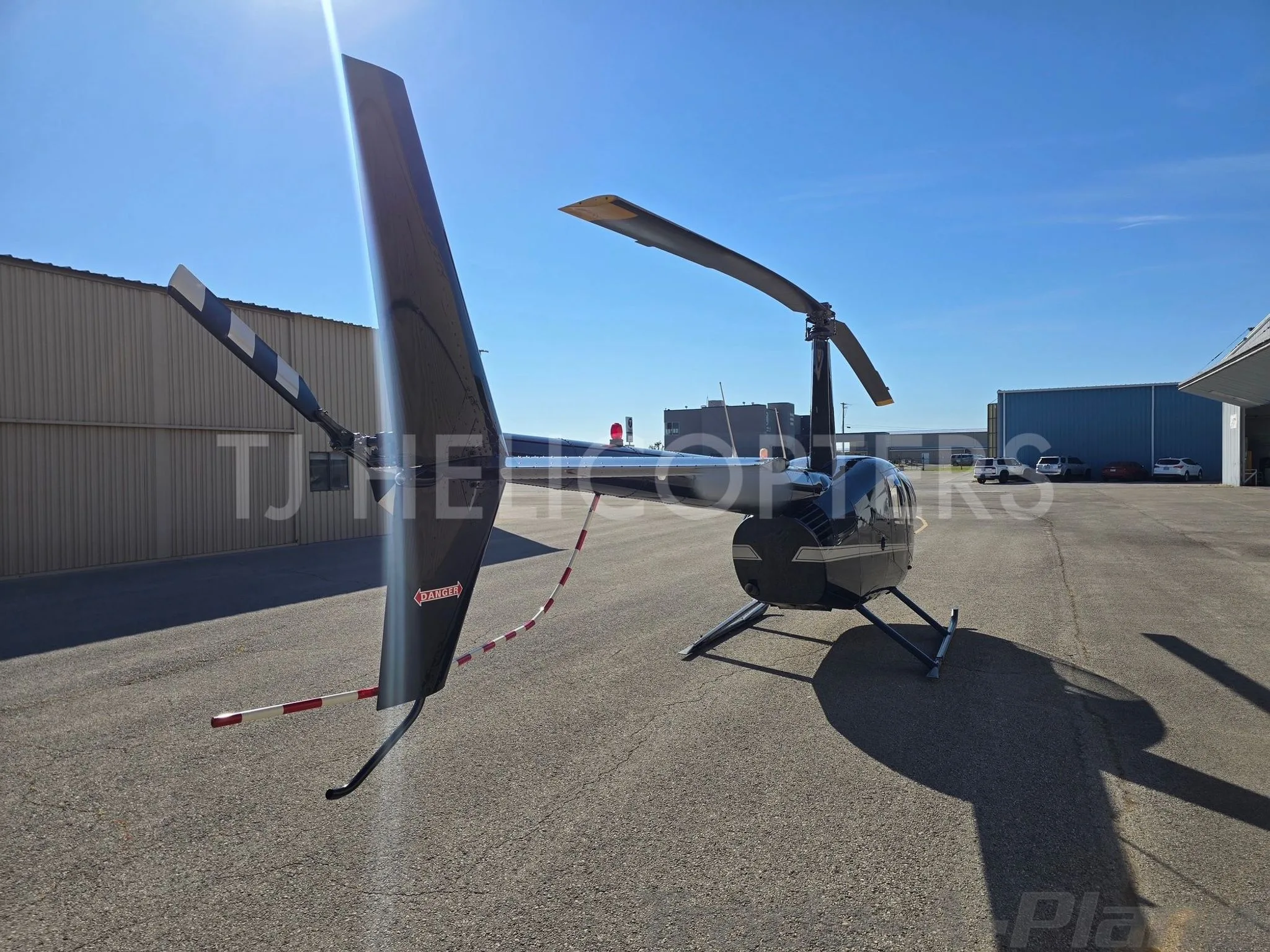 Exterior view of a 2007 ROBINSON R44 RAVEN II.