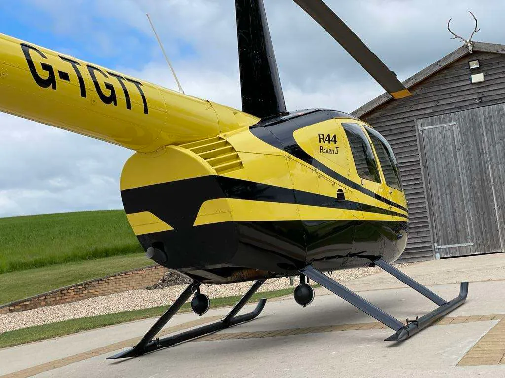 Marketing image of a 2002 Robinson R44 Raven II.