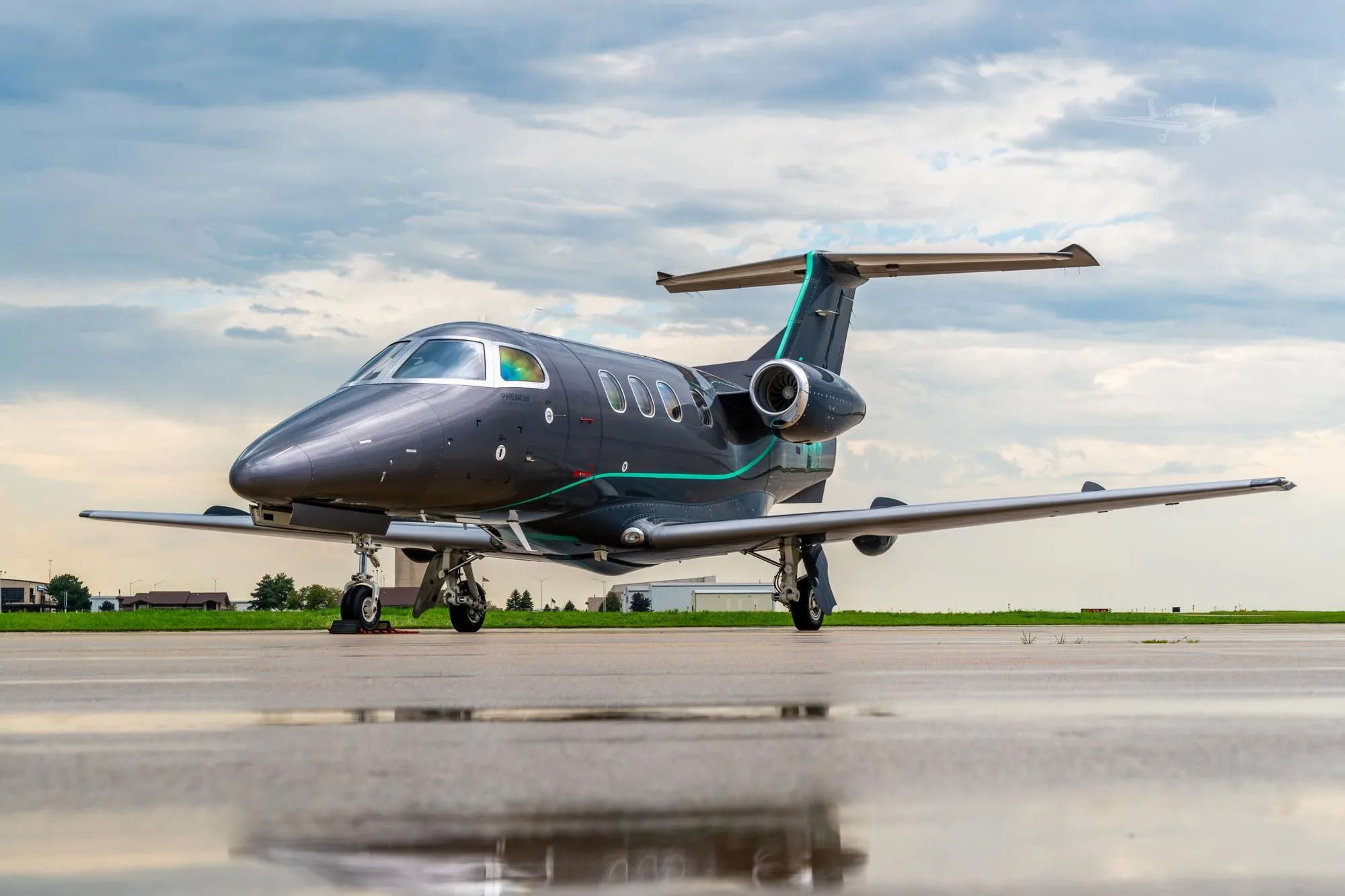 Exterior view of a 2010 EMBRAER PHENOM 100EV, N1WB.