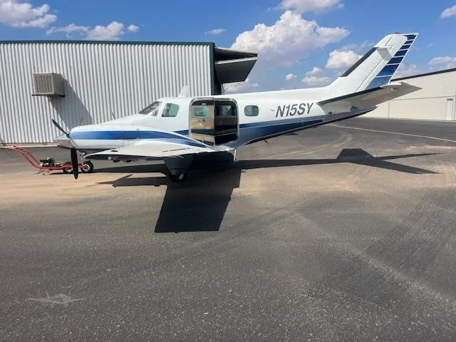 Exterior view of a 1969 BEECHCRAFT 60 DUKE, N15SY.