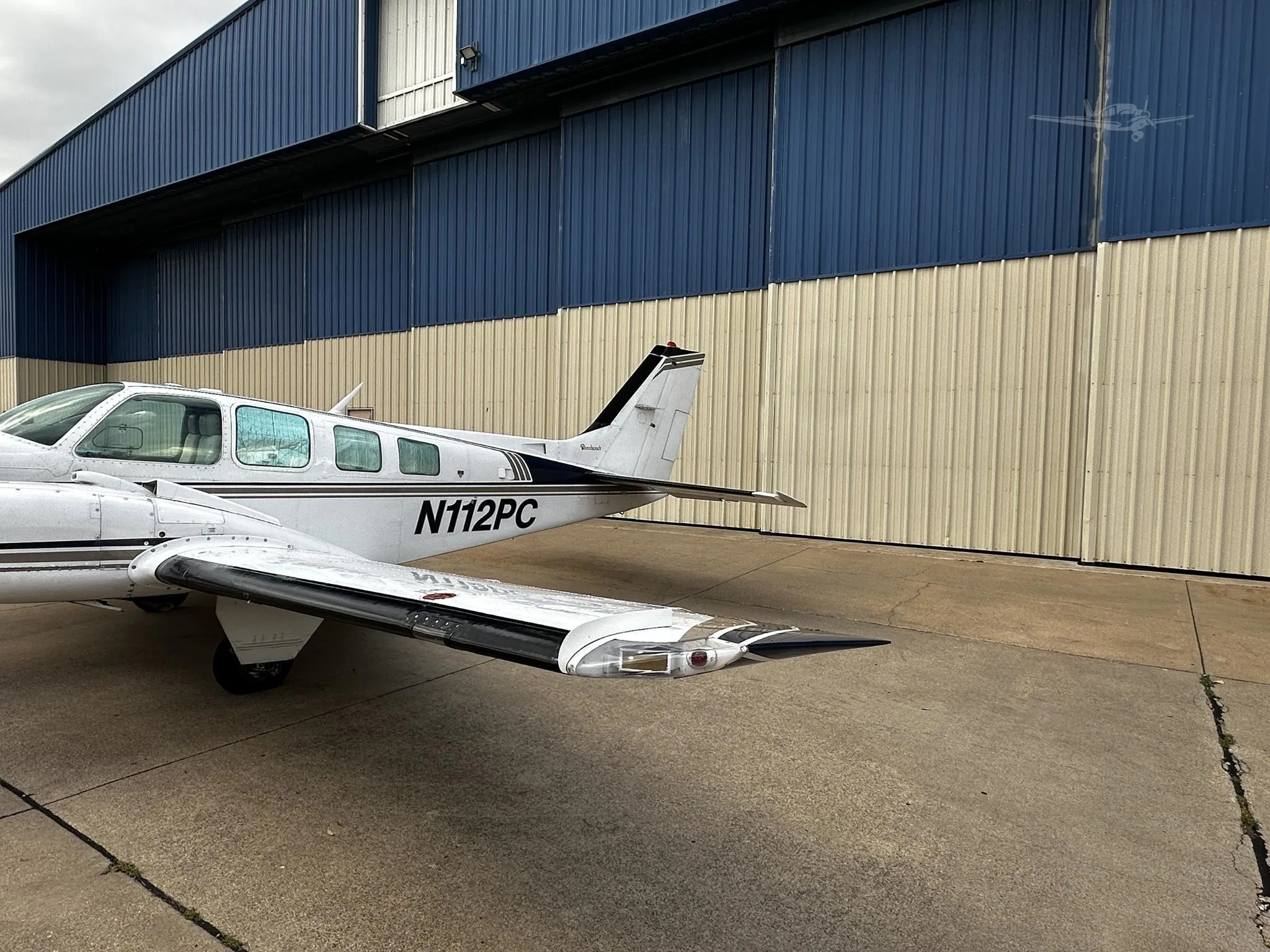 Exterior view of a 1976 BEECHCRAFT 58 BARON, N112PC.