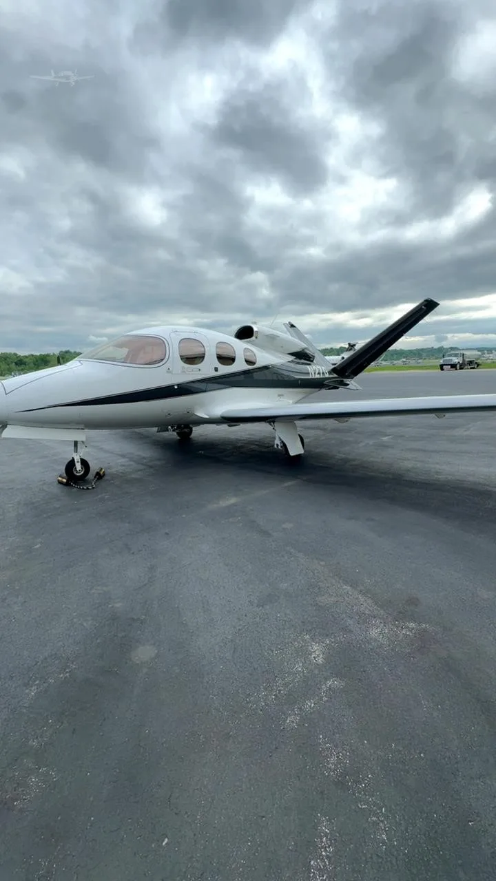 Exterior view of a 2022 CIRRUS VISION SF50-G2+, N27G.