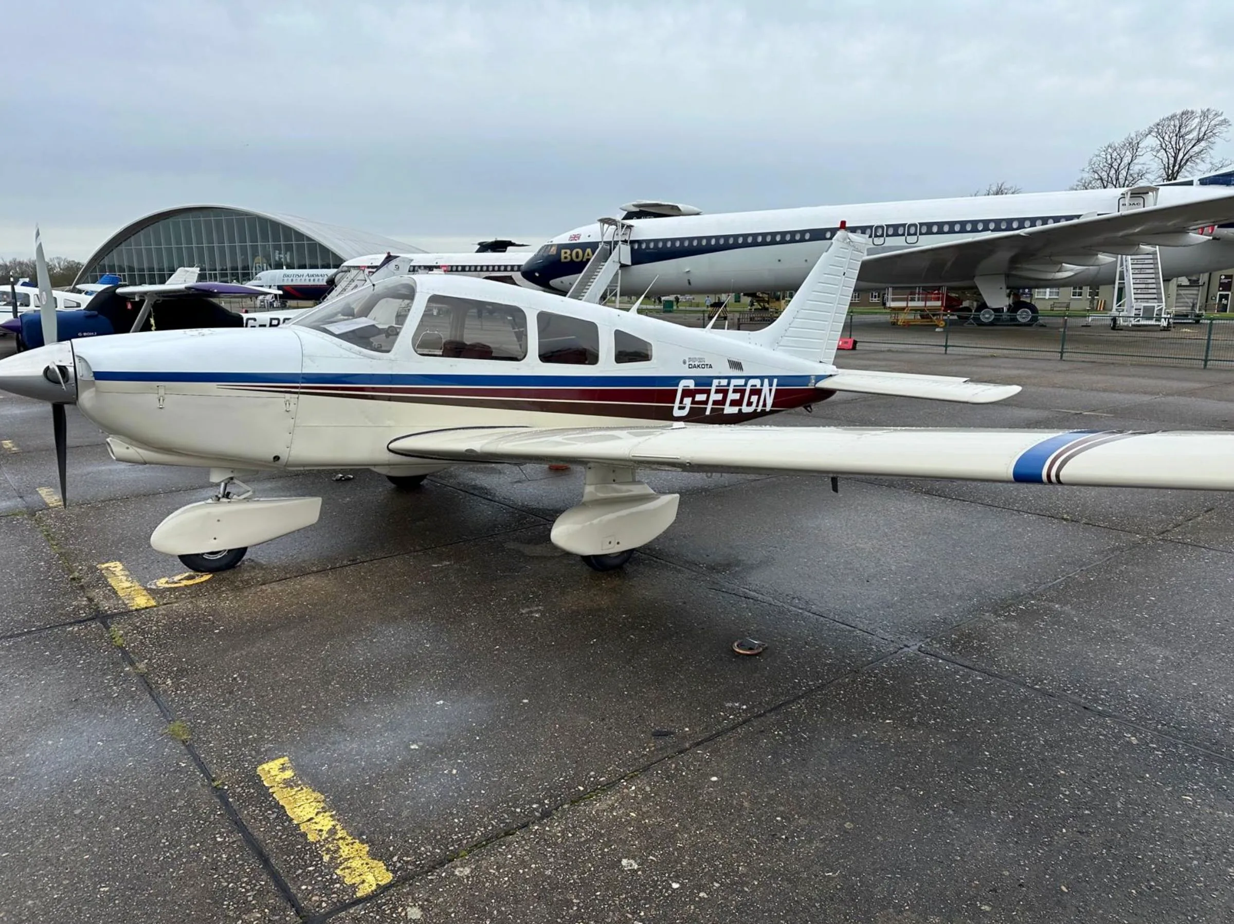 Exterior view of a 1984 Piper PA-28-236 Dakota, G-FEGN.
