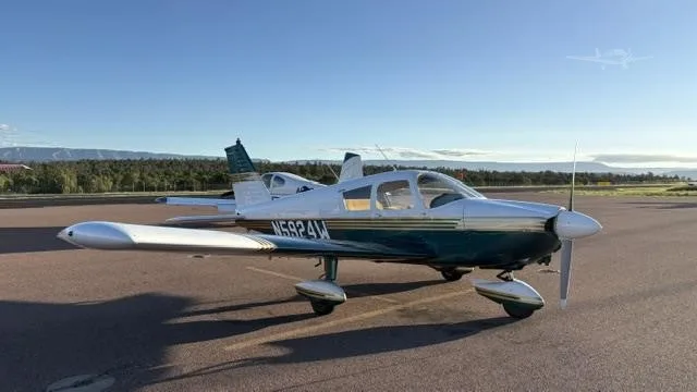 Exterior view of a 1966 PIPER CHEROKEE 180, N5924W.