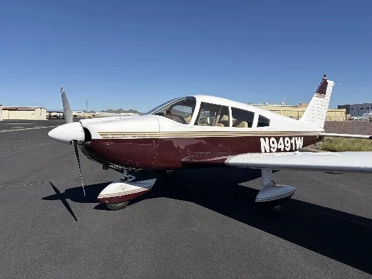 Exterior view of a 1969 Piper Cherokee 235, N9491W.
