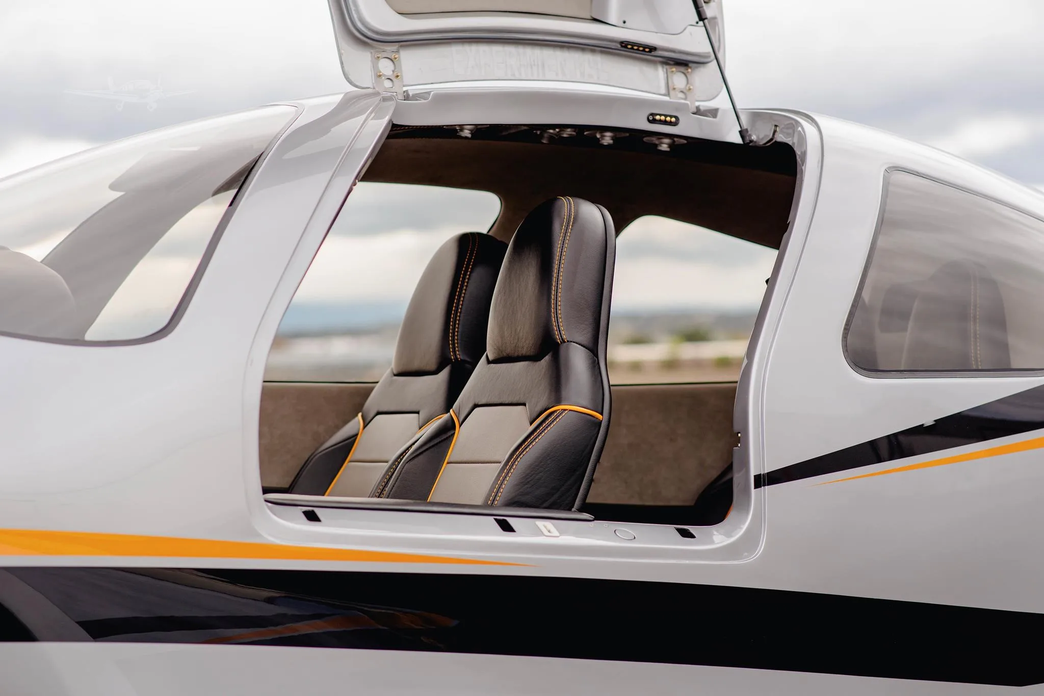 Exterior view of a 2003 LANCAIR IV-PT, N104PJ.