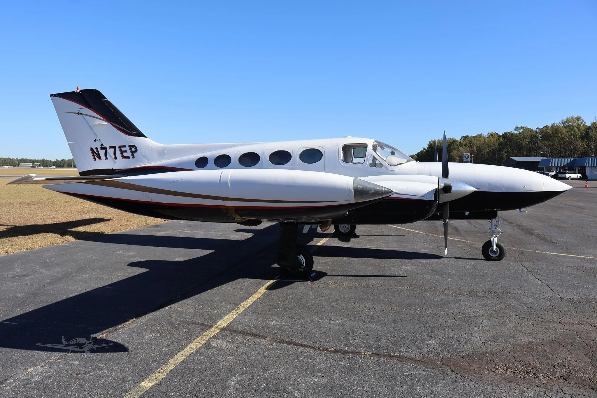 Exterior view of a 1973 CESSNA 421B, N77EP.