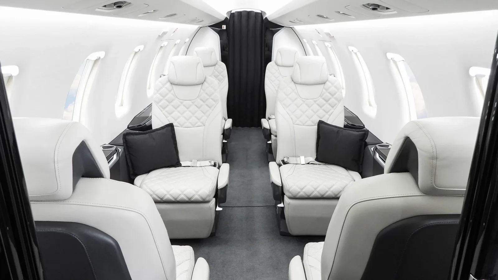 Cabin interior of a Pilatus Jet.