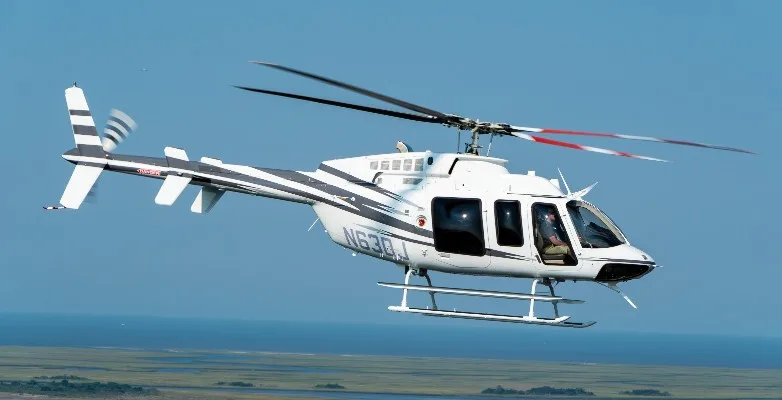Exterior view of a 2024 Bell 407, N63DJ.
