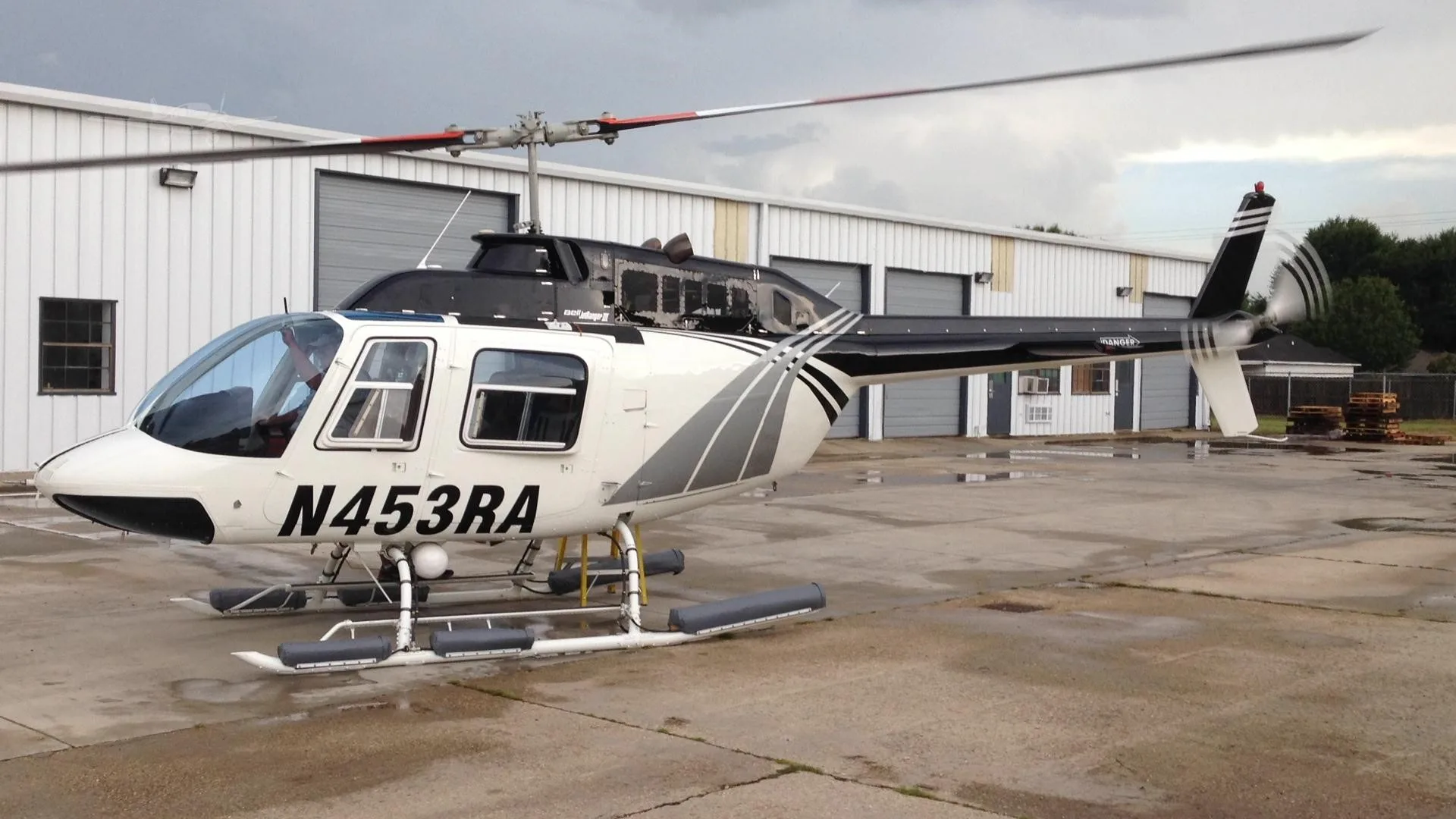 Exterior view of a 1981 BELL 206B III, N453RA.