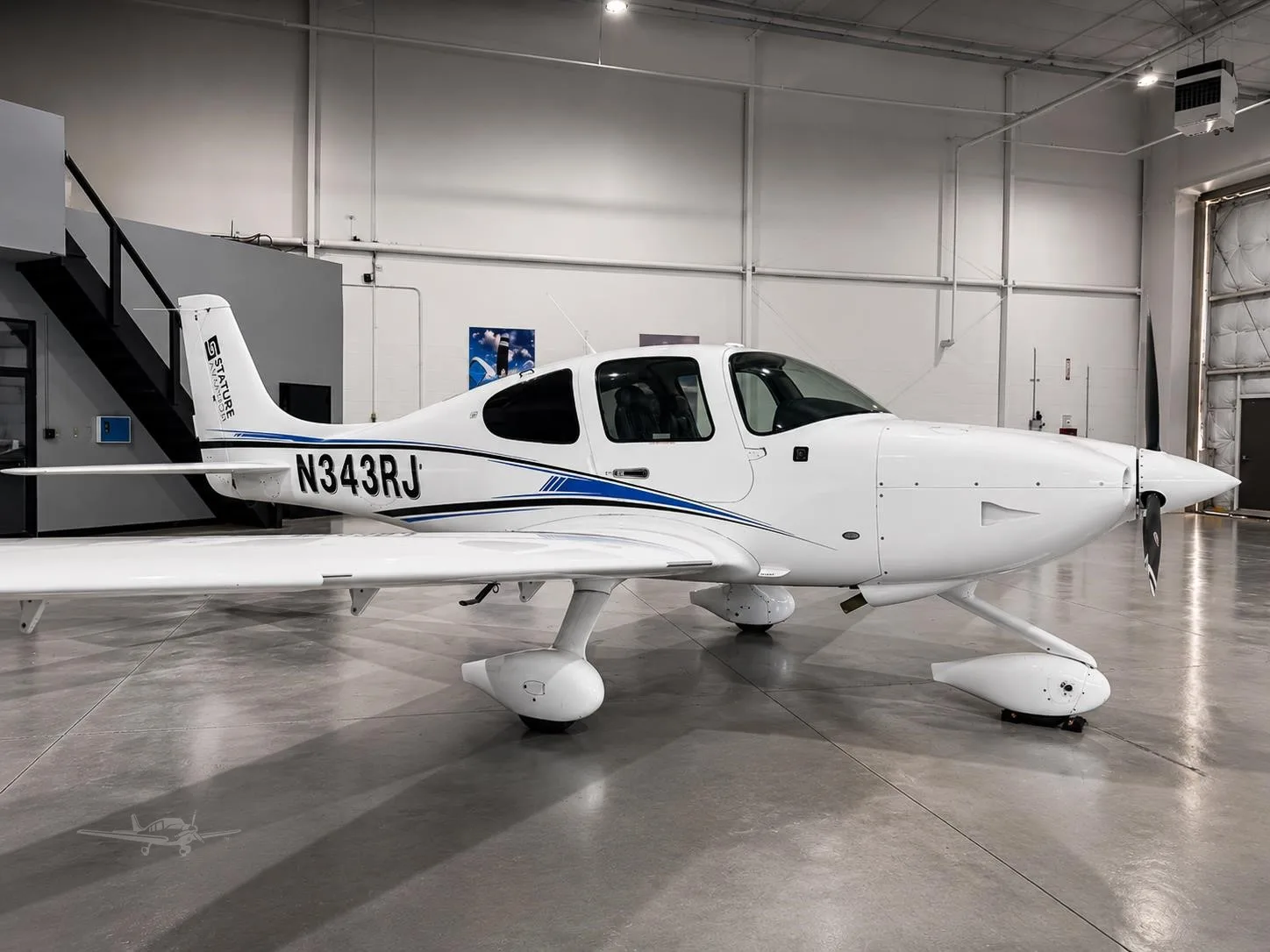 Exterior view of a 2022 CIRRUS SR20-G6, N343RJ.