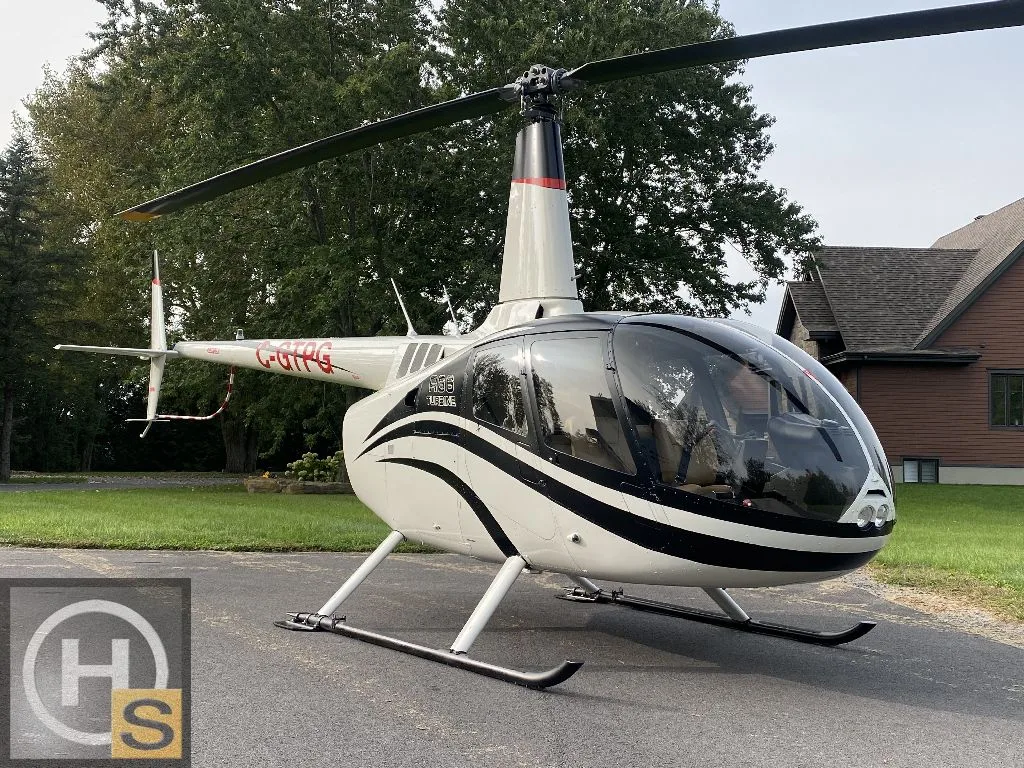 Exterior view of a 2014 Robinson R66 Turbine 2014, C-GTPG.