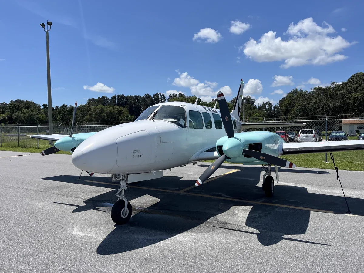 Exterior view of a 1973 Piper Navajo Chieftain, N242BZ.