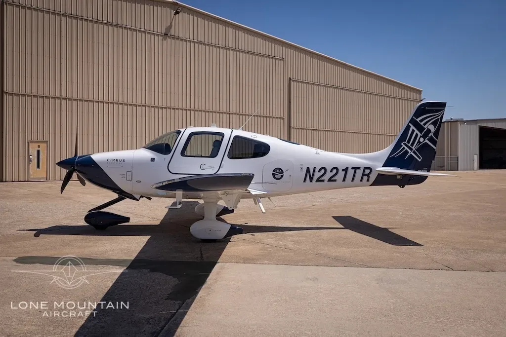 Exterior view of a 2021 Cirrus SR20, N221TR.