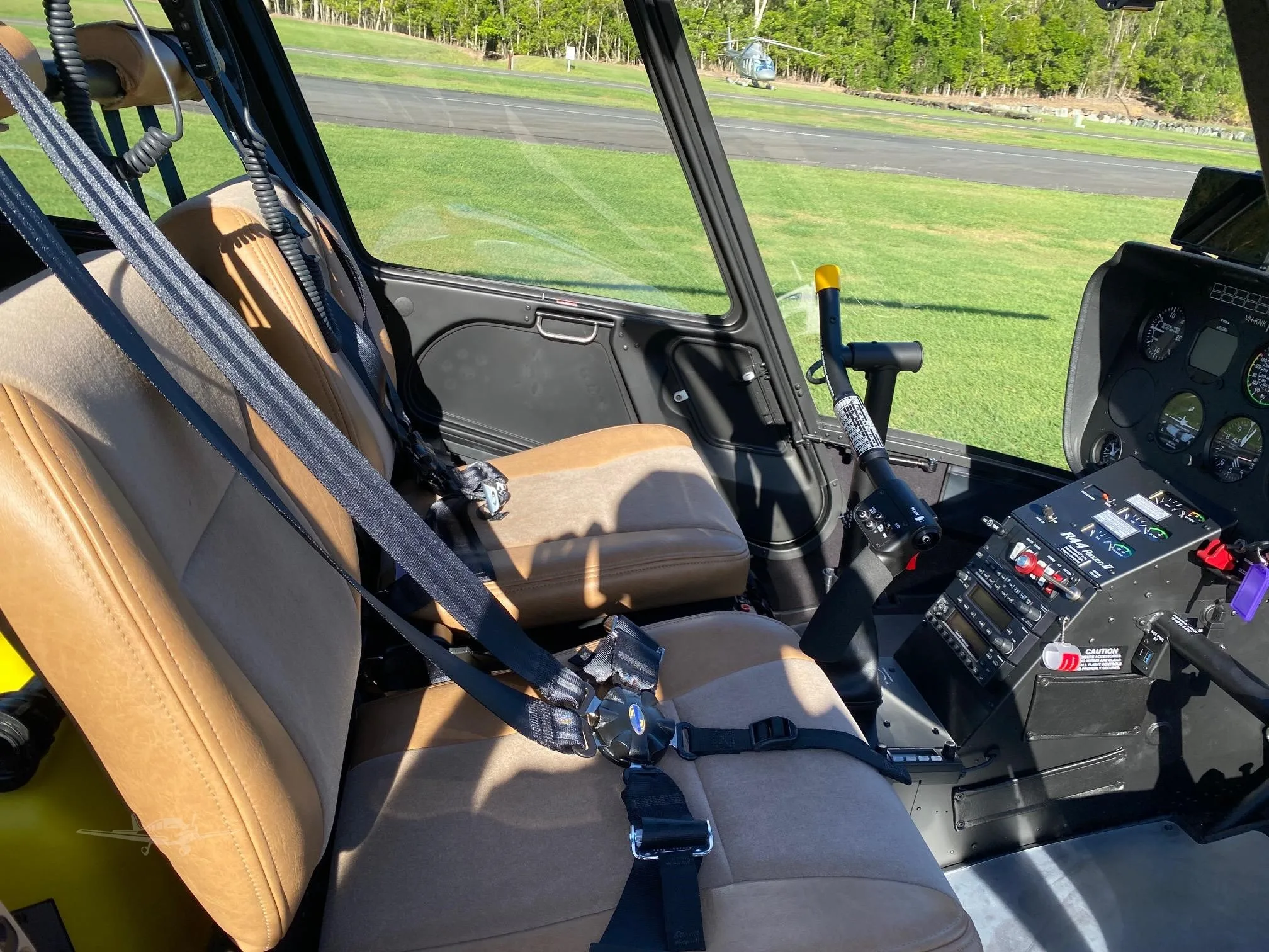 Cockpit and instrument panel of a 2021 ROBINSON R44 RAVEN II.
