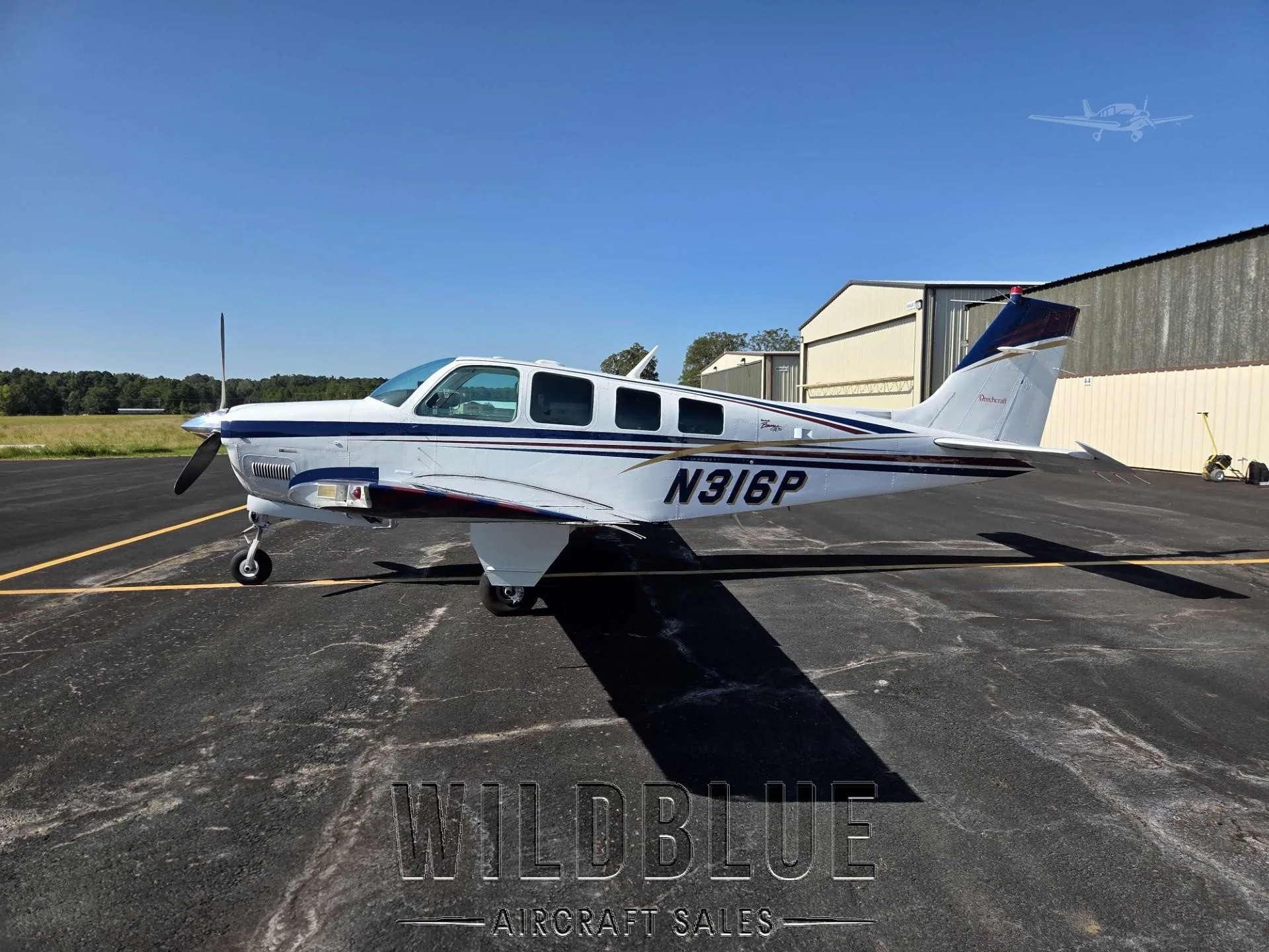 Exterior view of a 1999 BEECHCRAFT A36 BONANZA, N316P.