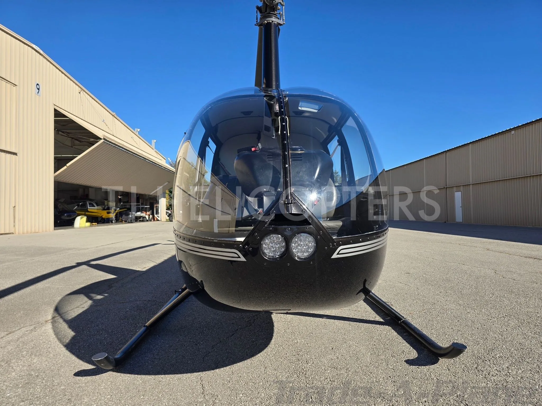 Exterior view of a 2007 ROBINSON R44 RAVEN II.