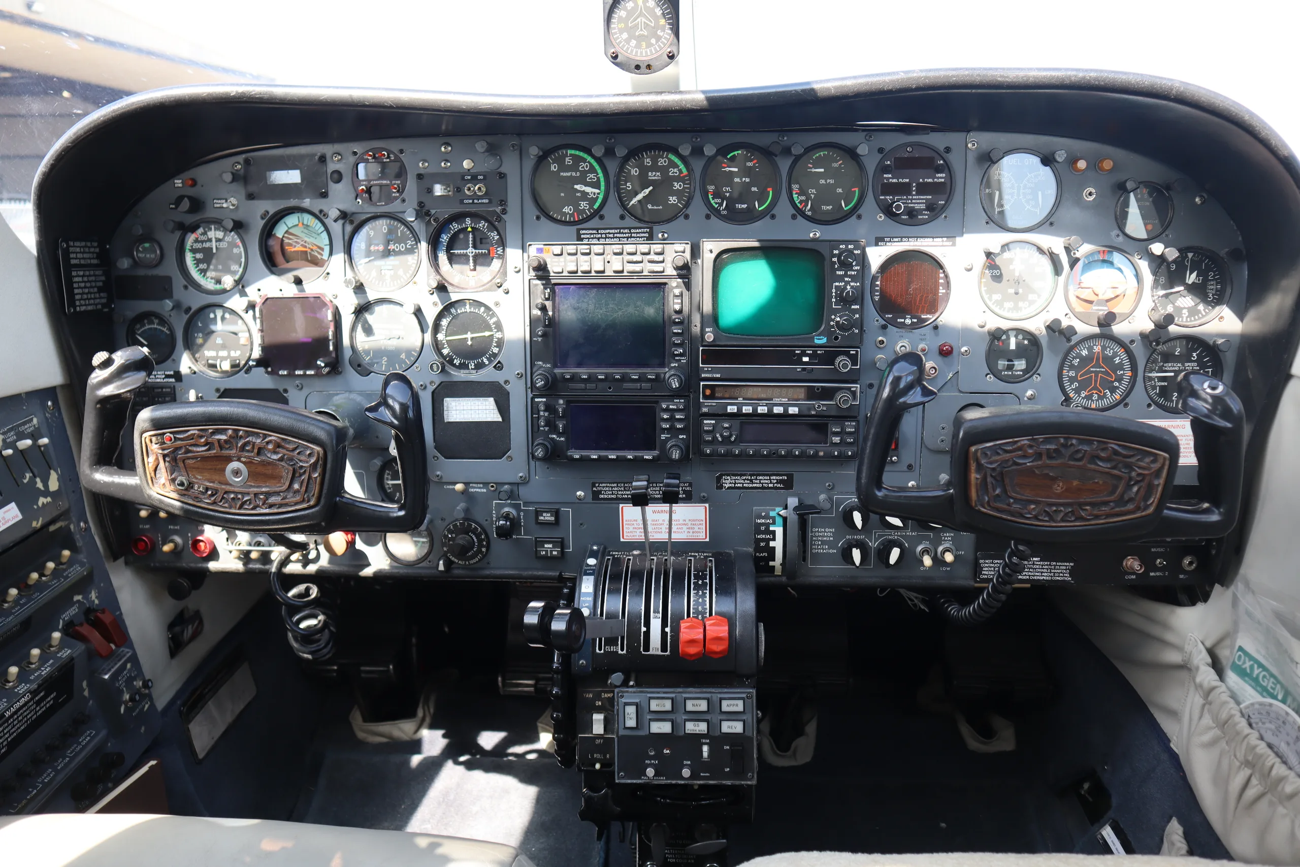 Cockpit and instrument panel of a 1976 Cessna 340A | TAS Aviation.