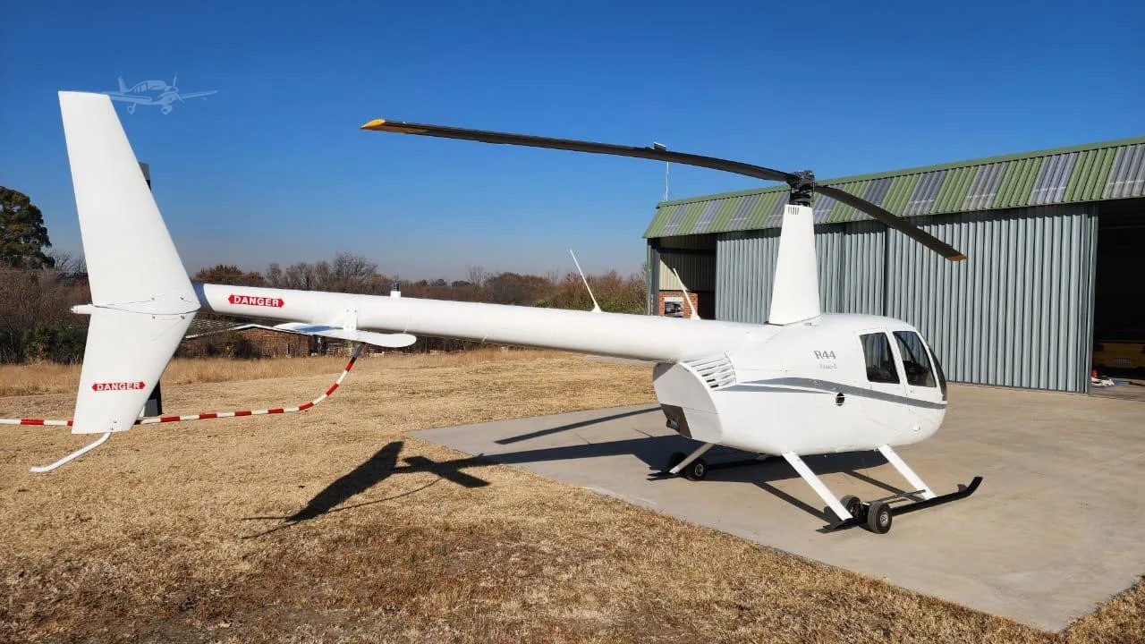 Exterior view of a 2007 ROBINSON R44 RAVEN II.
