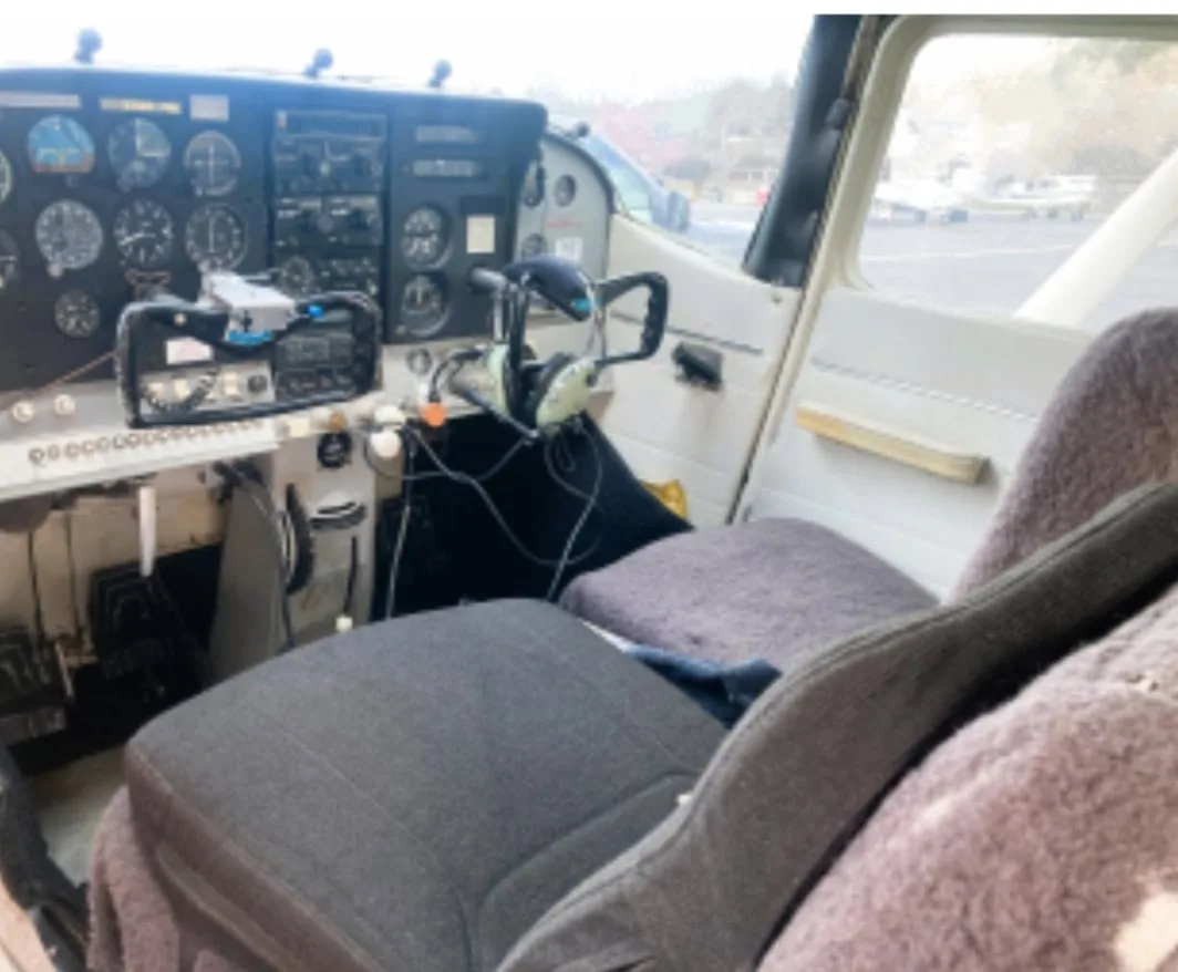 Cockpit and instrument panel of a 1968 Piper 182H.
