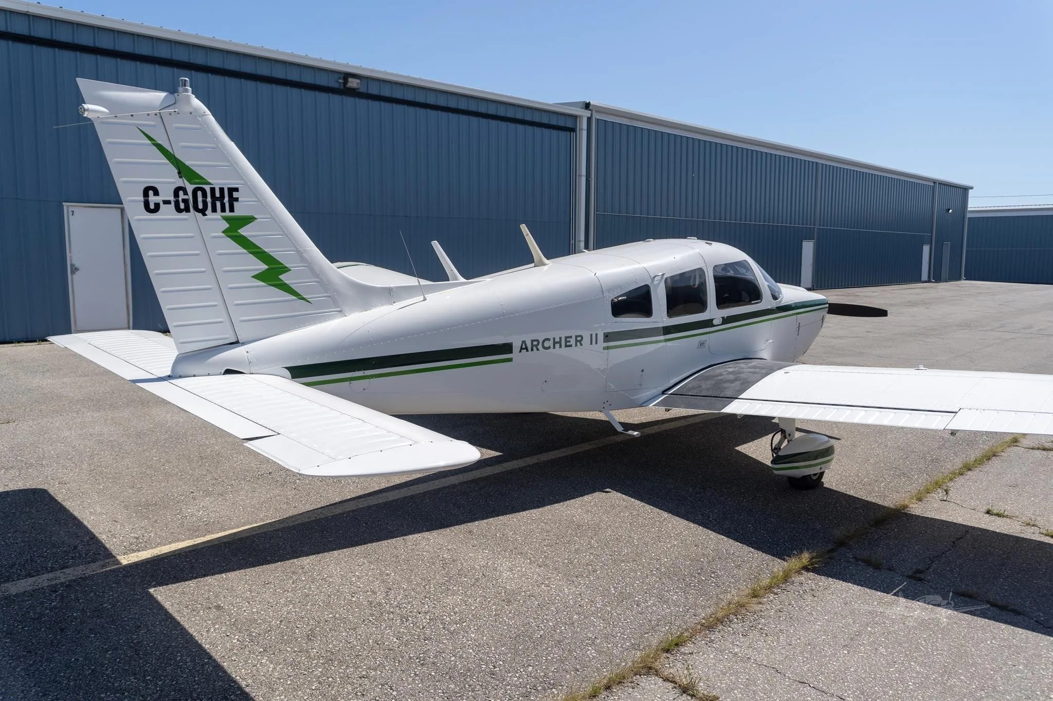 Exterior view of a 1977 PIPER ARCHER II, C-GQHF.