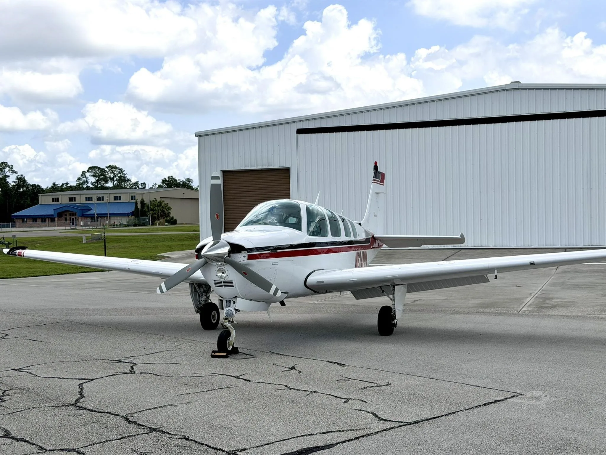 Exterior view of a 1980 BEECHCRAFT A36 BONANZA, N614MM.
