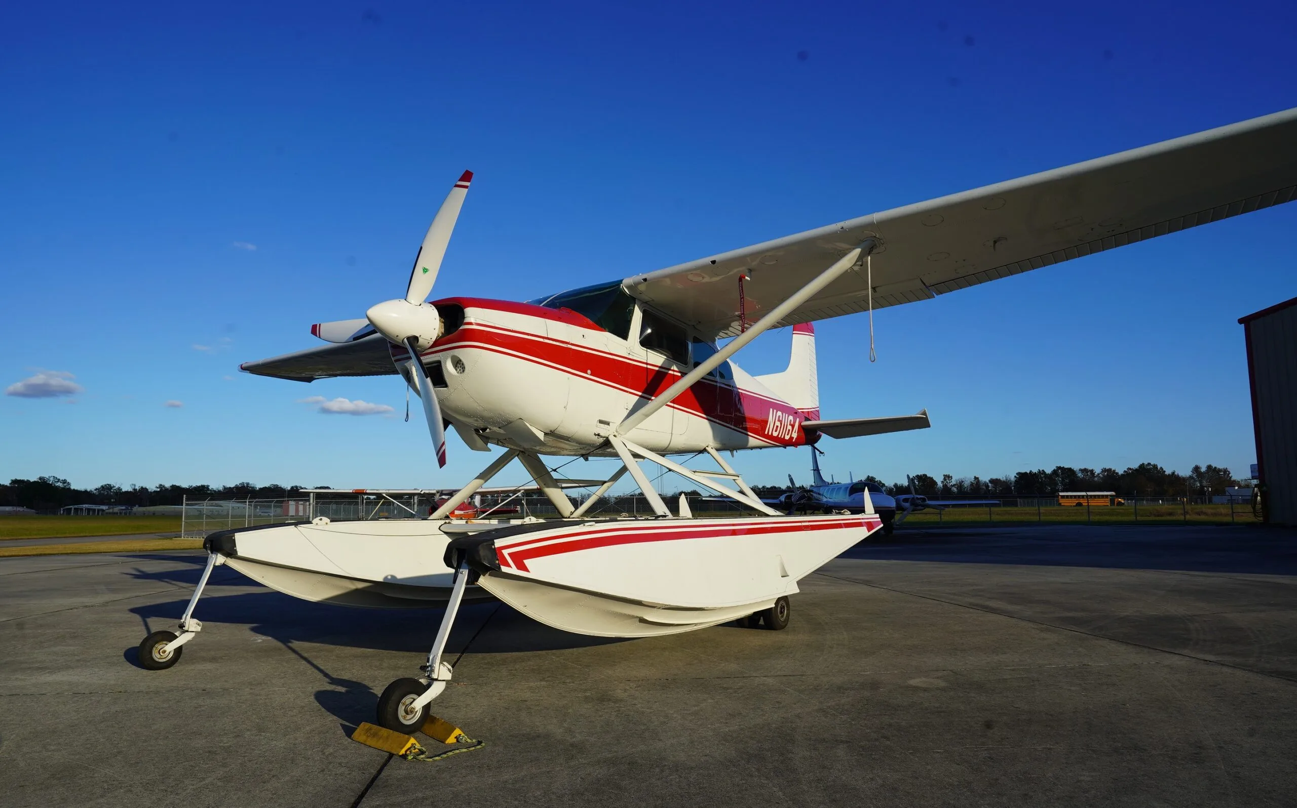 Exterior view of a 1980 Cessna A185F Amphibian, N61164.