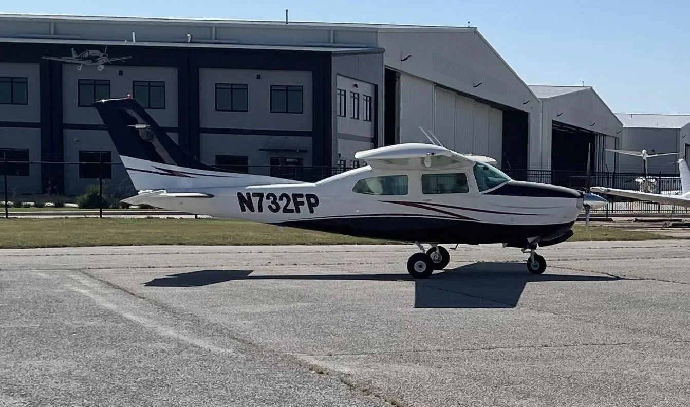 Exterior view of a 1976 CESSNA 210L, N732FP.